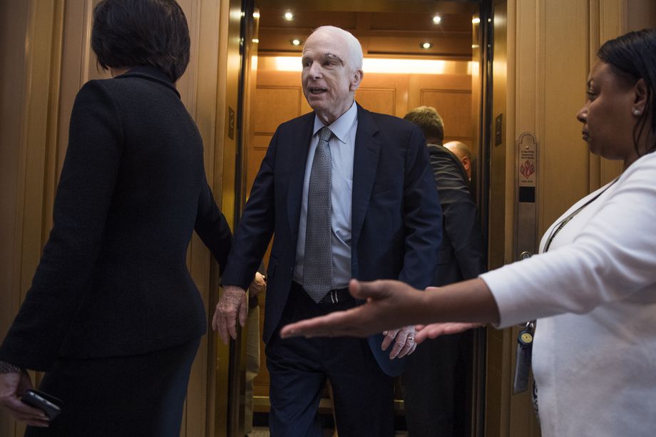 John McCain walks onto the Senate floor Tom Williams CQ Roll Call Getty.jpg
