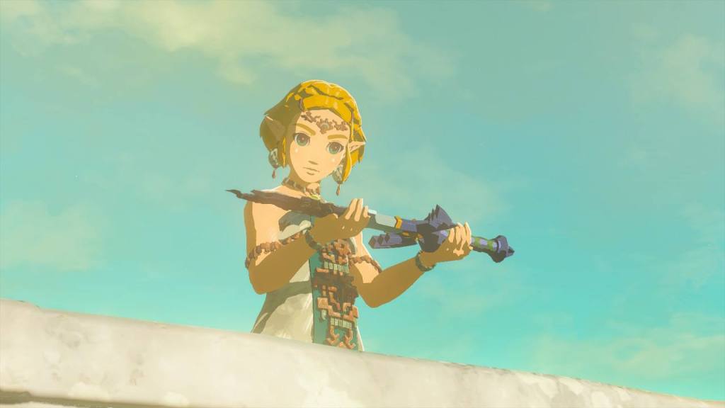 Zelda holds the corrupted Master Sword.