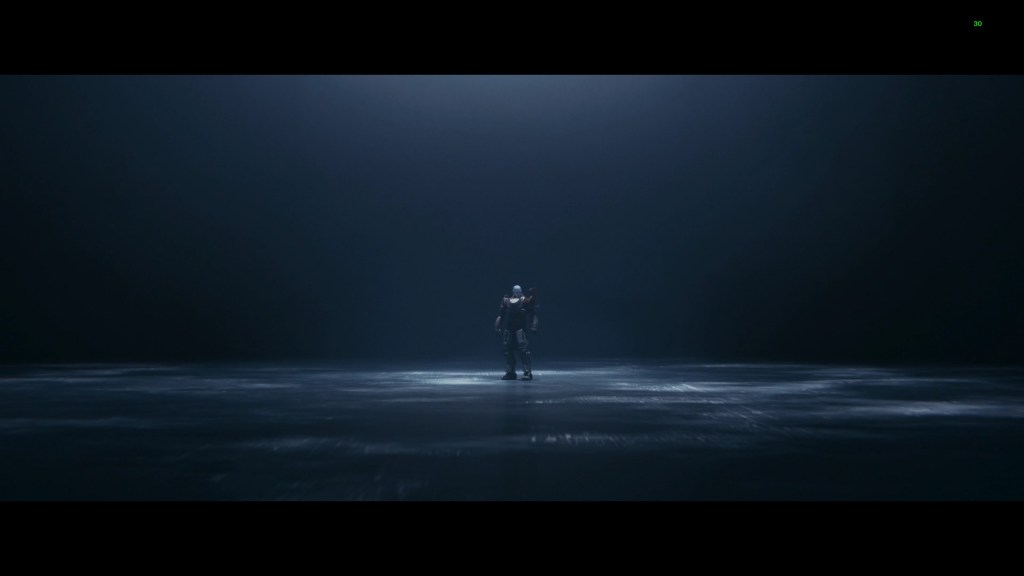 A screenshot from Destiny 2. Commander Zavala stands, alone, in a shadowy void.
